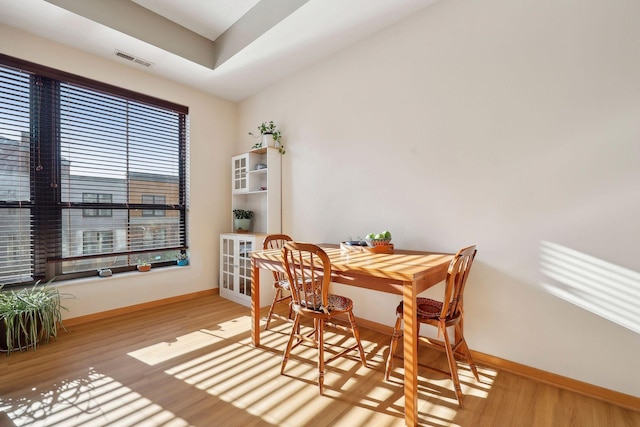 dining area with light wood-type flooring