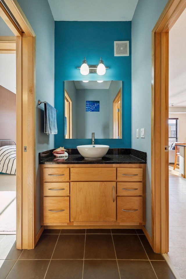 bathroom featuring vanity and tile patterned floors