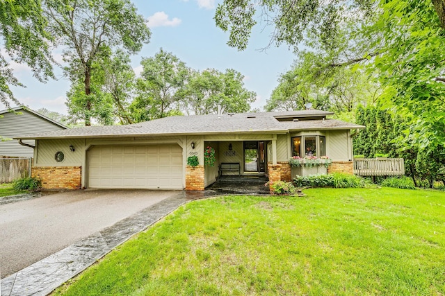 6645 Lancaster Ln N, Maple Grove, MN 55369 - view of front of property featuring brick siding, driveway, a garage, and a front lawn