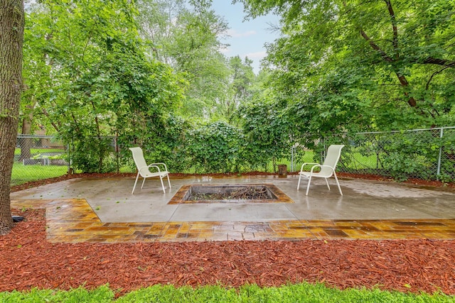 6645 Lancaster Ln N, Maple Grove, MN 55369 - fenced backyard featuring a patio and a fire pit