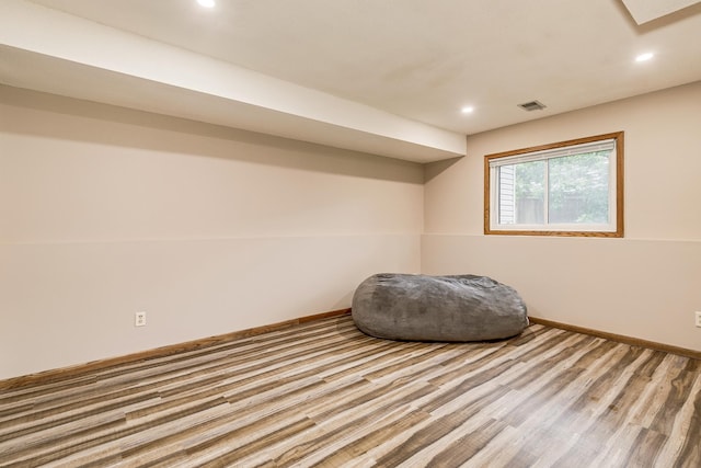 6645 Lancaster Ln N, Maple Grove, MN 55369 - sitting room with recessed lighting and wood finished floors