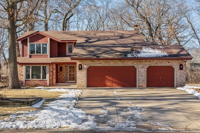 view of front of home with a garage