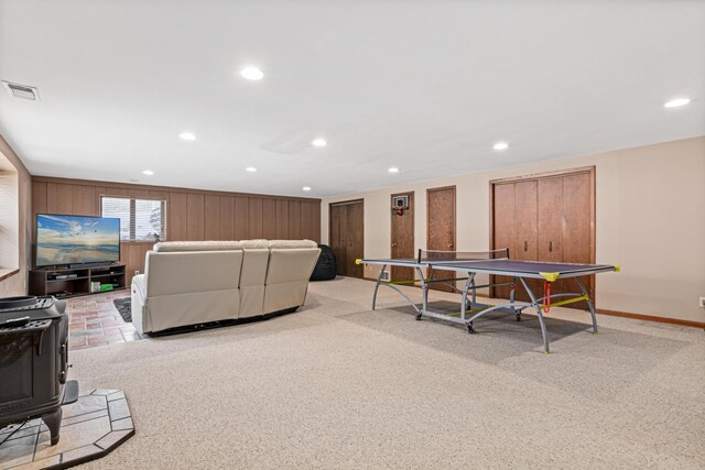 recreation room featuring light carpet, visible vents, and recessed lighting