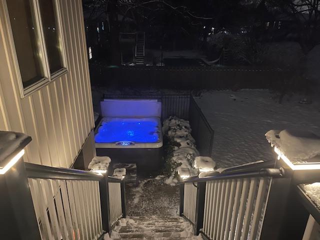 view of pool at night