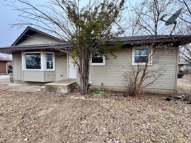 view of front of home featuring a patio area