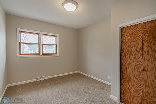 empty room with carpet floors