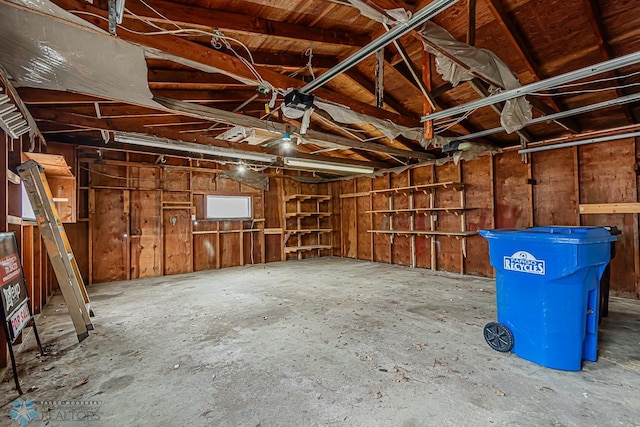 garage featuring a garage door opener