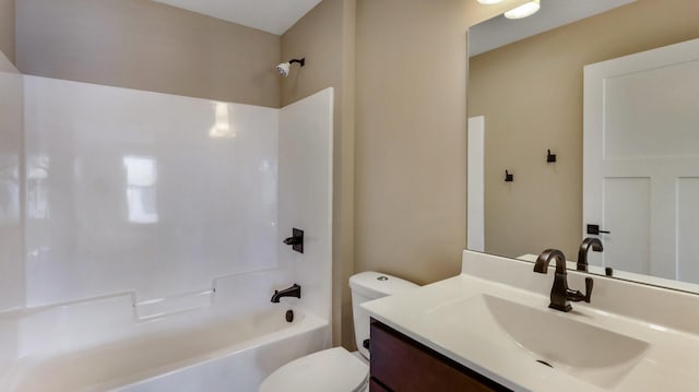 full bathroom with vanity, bathtub / shower combination, and toilet