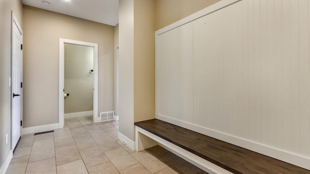 mudroom featuring light tile patterned floors