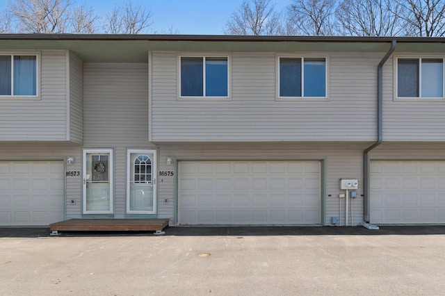 view of property featuring an attached garage