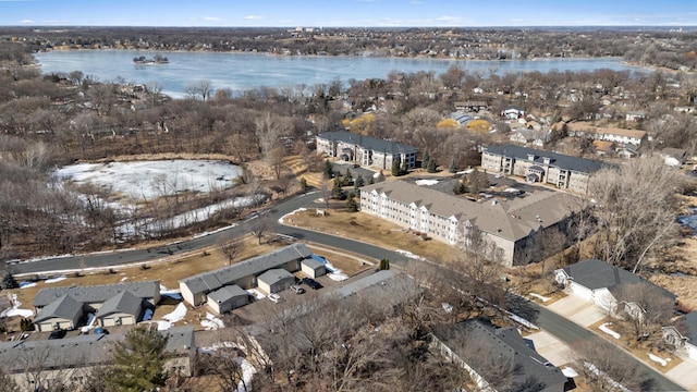 aerial view featuring a water view and a residential view