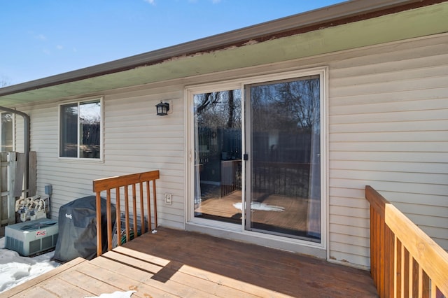 wooden terrace featuring area for grilling