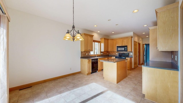 kitchen featuring visible vents, a kitchen island, black appliances, dark countertops, and tasteful backsplash