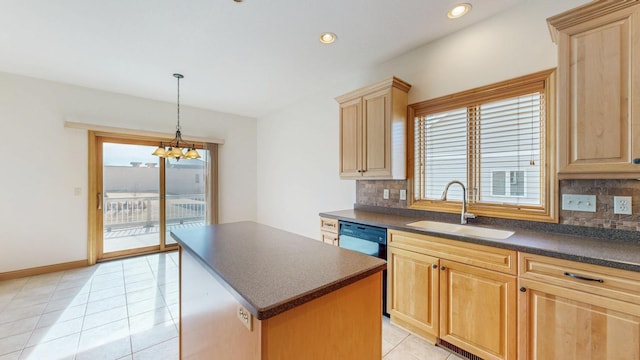 kitchen with light brown cabinetry, dark countertops, a sink, black dishwasher, and backsplash