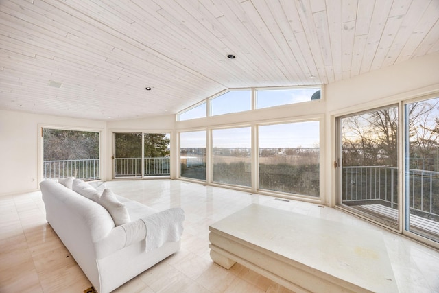 sunroom with lofted ceiling and wooden ceiling