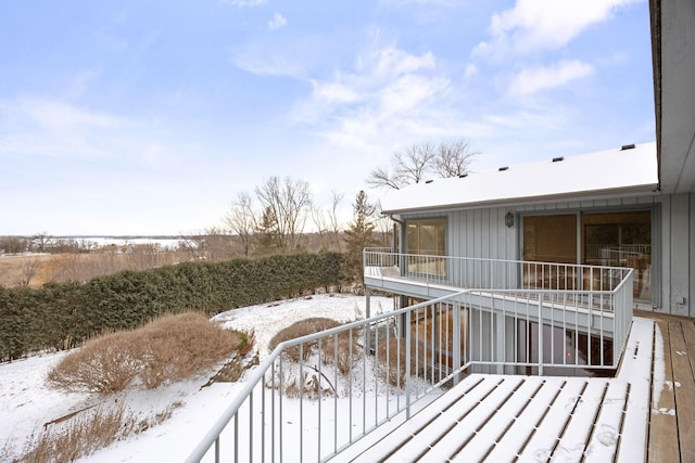 view of snow covered deck