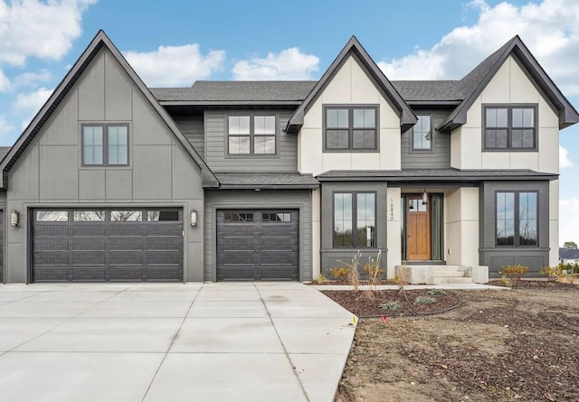 modern farmhouse style home featuring an attached garage, concrete driveway, and roof with shingles