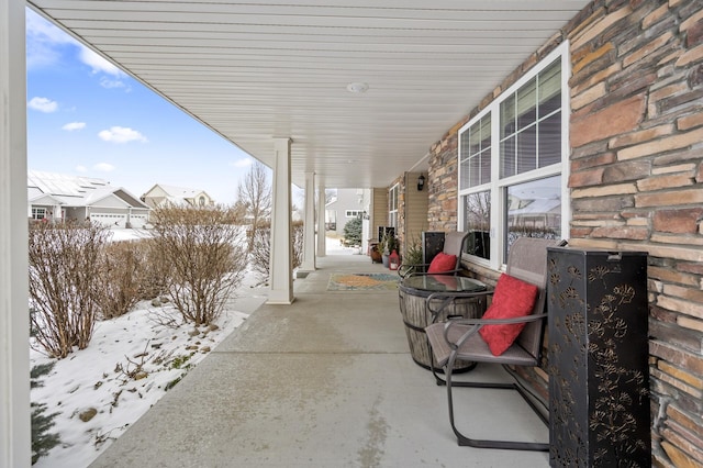 view of snow covered patio