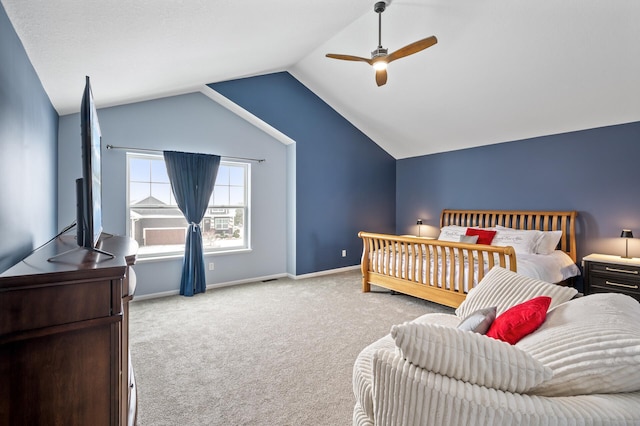 bedroom featuring vaulted ceiling, ceiling fan, carpet flooring, and baseboards