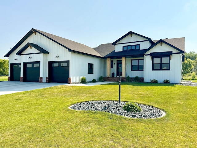 106 19th St NE, Barnesville, MN 56514 - modern farmhouse featuring a front lawn, driveway, an attached garage, board and batten siding, and a shingled roof