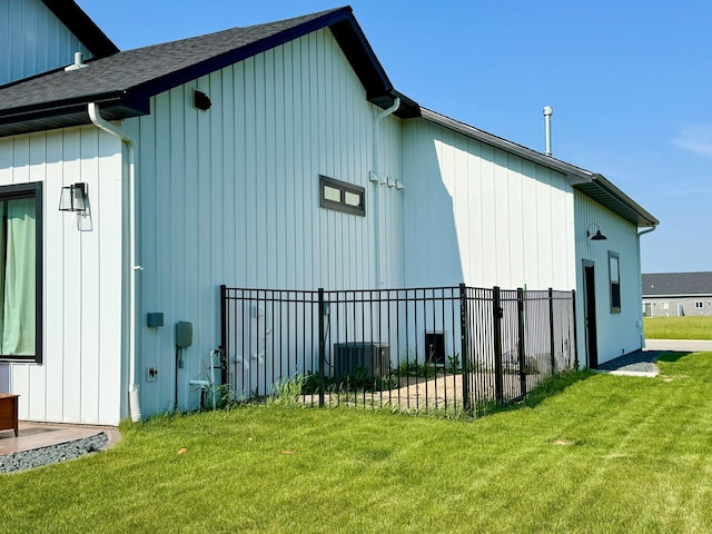 106 19th St NE, Barnesville, MN 56514 - view of side of home with central AC and roof with shingles