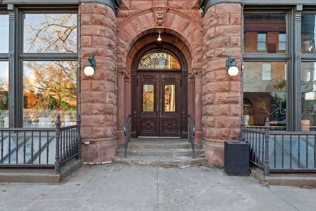 property entrance featuring french doors