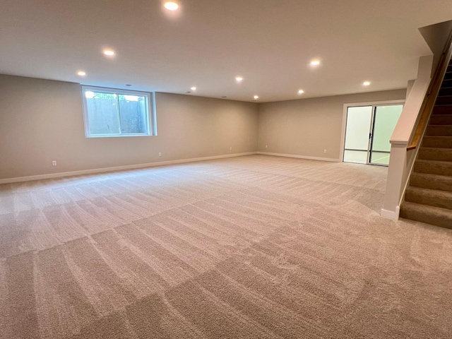 empty room featuring light carpet