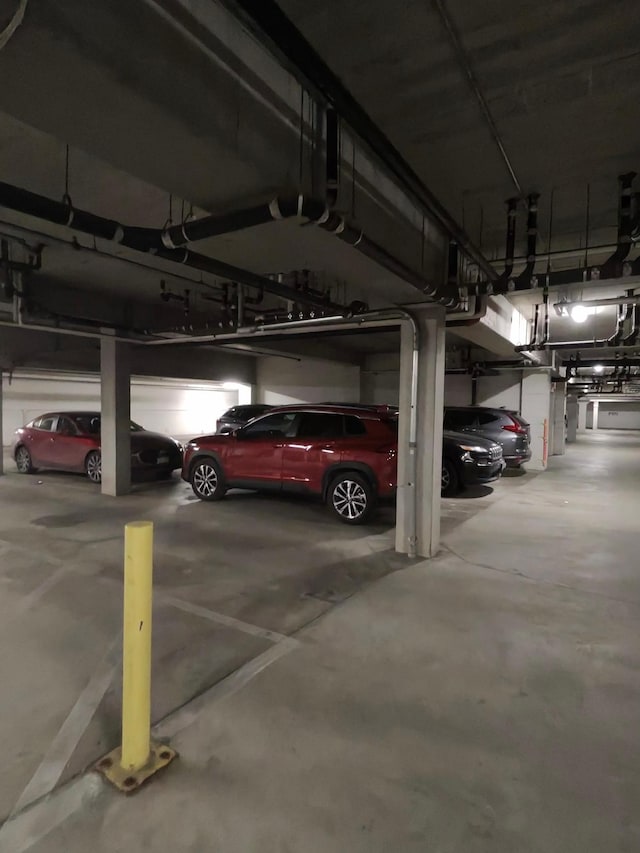 parking deck featuring a garage door opener