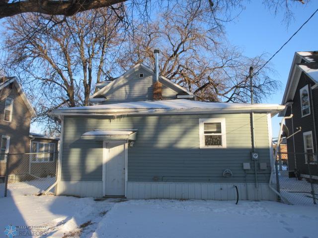 view of snow covered property