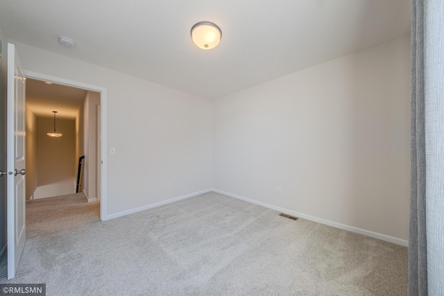 empty room featuring carpet