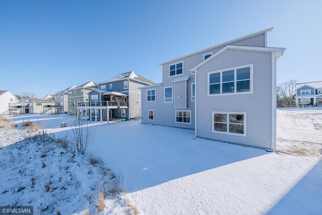 view of snow covered house