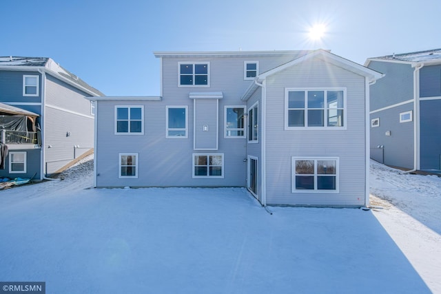 view of snow covered property