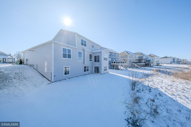 view of snow covered house