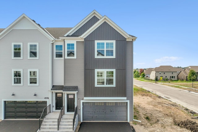 view of front of property featuring a garage