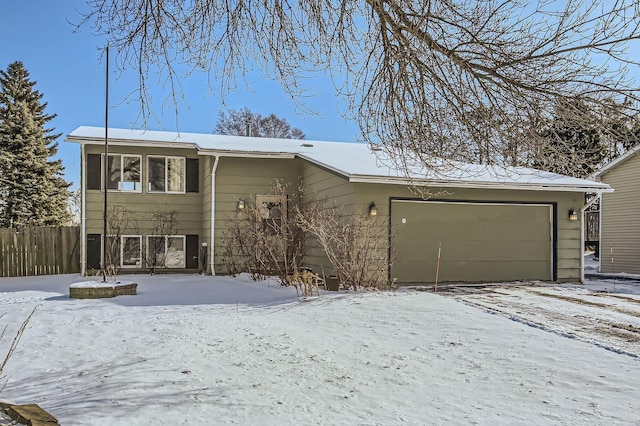 view of front of home with a garage