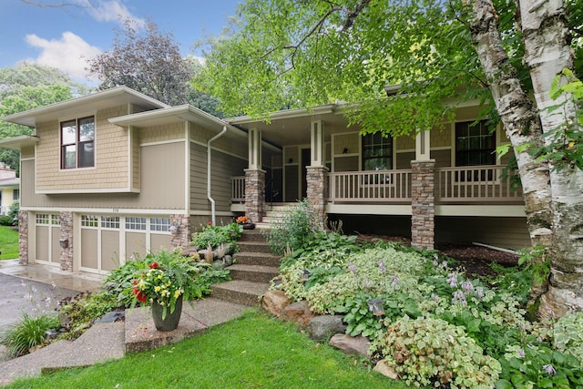 view of front of property with a garage