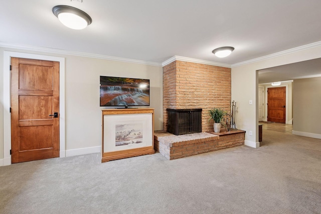 unfurnished living room featuring ornamental molding, a brick fireplace, baseboards, and carpet floors