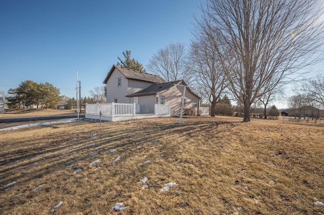 view of home's exterior featuring a yard