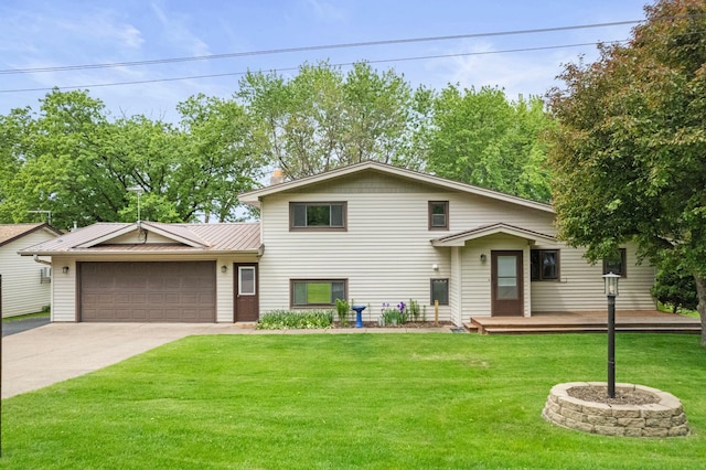 1697 Shore Dr, Arthur Twp, MN 55051 - split level home with a front yard, a standing seam roof, metal roof, a deck, and a garage