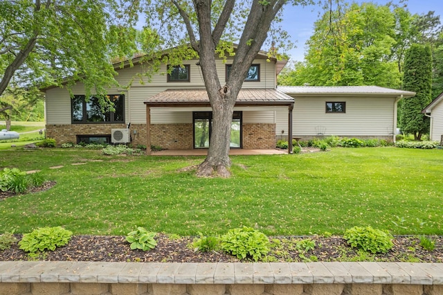 1697 Shore Dr, Arthur Twp, MN 55051 - view of front of property featuring ac unit, a patio, and a front yard