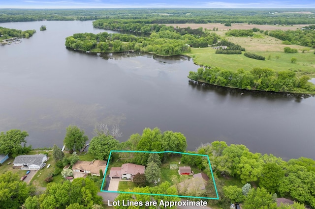 1697 Shore Dr, Arthur Twp, MN 55051 - aerial overview of property's location with a nearby body of water, property boundaries highlighted, and a heavily wooded area