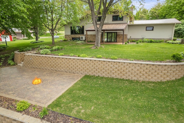 1697 Shore Dr, Arthur Twp, MN 55051 - back of house with a lawn and brick siding