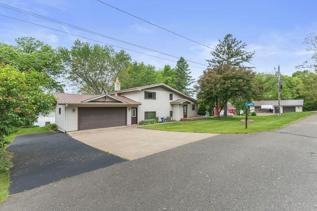 1697 Shore Dr, Arthur Twp, MN 55051 - view of front of property with a front lawn, a chimney, and metal roof