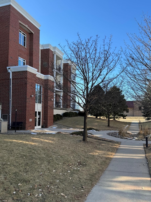 exterior space with a lawn