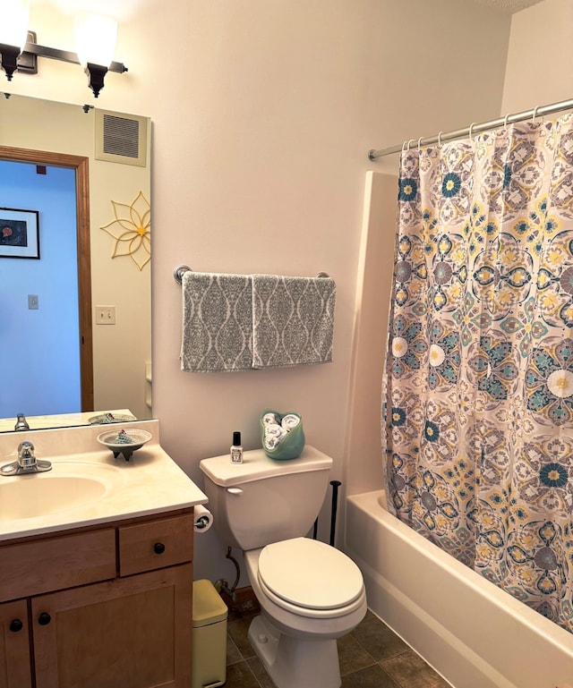 full bathroom featuring tile patterned flooring, vanity, toilet, and shower / bathtub combination with curtain