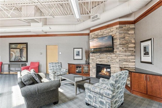 14587 Florissant Path Unit 225, Apple Valley, MN 55124 - living room featuring a stone fireplace and a towering ceiling
