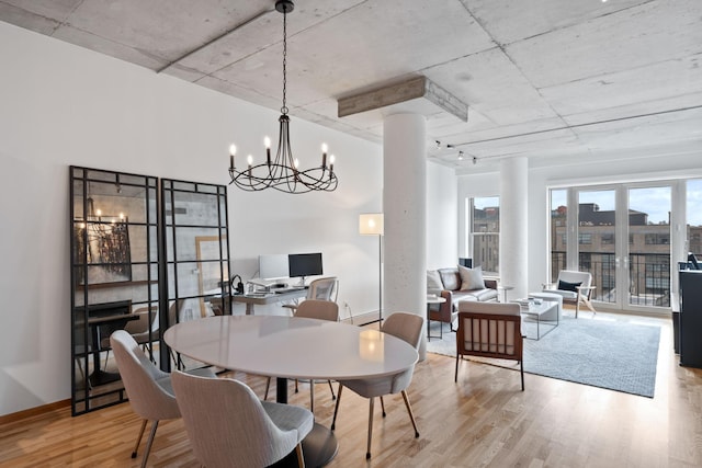 dining area featuring light wood-type flooring