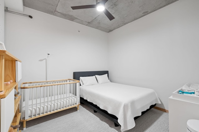 carpeted bedroom with ceiling fan