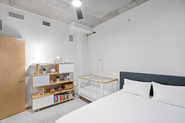 carpeted bedroom featuring ceiling fan