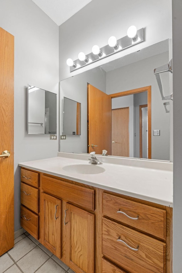 bathroom featuring vanity and tile patterned floors